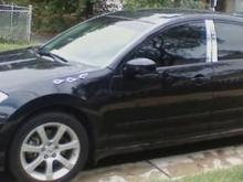 windows tinted and chrome door pillars