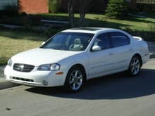 This is my simple Pearl White 2001 Maxima 20th Anniversary