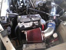 Rotated battery, got rid of the Injen, and 1/0 gauge grounding kit.
