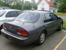 97 Nissan Maxima Rear, the purple must go :)