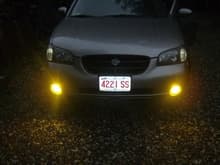 lexus fogs.. stock bulbs w/out glare gaurds tinted yellow lens
