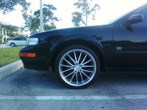 LF 19 x 8.5 before replacing Falken 245/35/19. About 3.5 inch from fender to tire