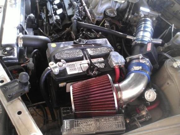 Rotated battery, got rid of the Injen, and 1/0 gauge grounding kit.