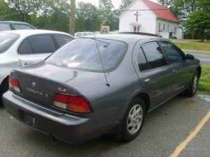 97 Nissan Maxima Rear, the purple must go :)