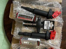 The set of 4 Ignition coils and 4 spark plugs and the puller tool