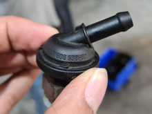 Crankcase vent hose Valve. Hose itself needs replacing. Part NO 11157632333