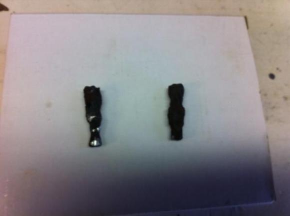 photo 1[1] These look more like Rivets than rusted bolts.. With a pair of needle nose vise grips just clamp on n bingo they pop right out so no drilling required.