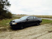 The Black Monte of Jeffs02rwdSS along the road Corn Field in the background