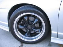 C5 calipers with drill/slotted rotor, 
255/45/18 dunlop on 18x9 deep dish mustang bullitt rim.