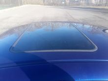 Nice sunroof that works fine. No leaks. Headliner is perfect too. 