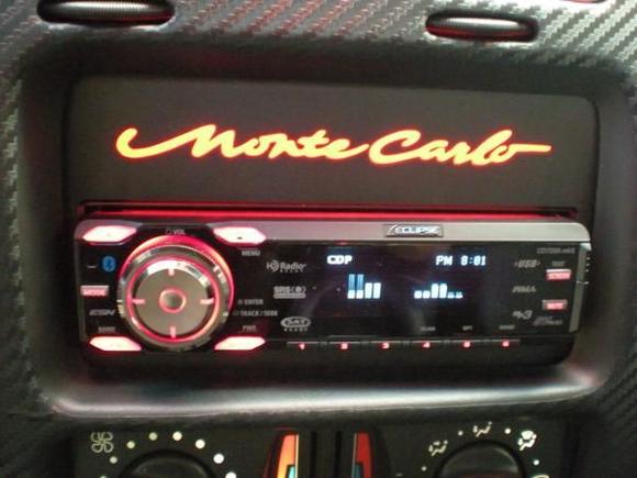 Custom made head unit mount from HUMount in Canada; Eclipse CD7200 head unit.

If you want the head unit mount (you can get one that has 'SS' in it as well and in a multitude of colors), hit up maptechenterprises.com. They also make these for many other types of vehicles.