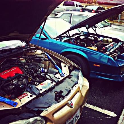 Most recent engine bay shot with my cousins 91 Camaro RS