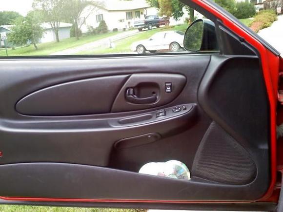 Driver Door - some crappy CD's still sitting there. hoping to get a new paint job soon