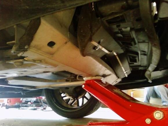 A pic of the underbody setup I installed and then dropped the car off my jack! learned a valuable lesson lock the parking brake! took out my one strip and radiator