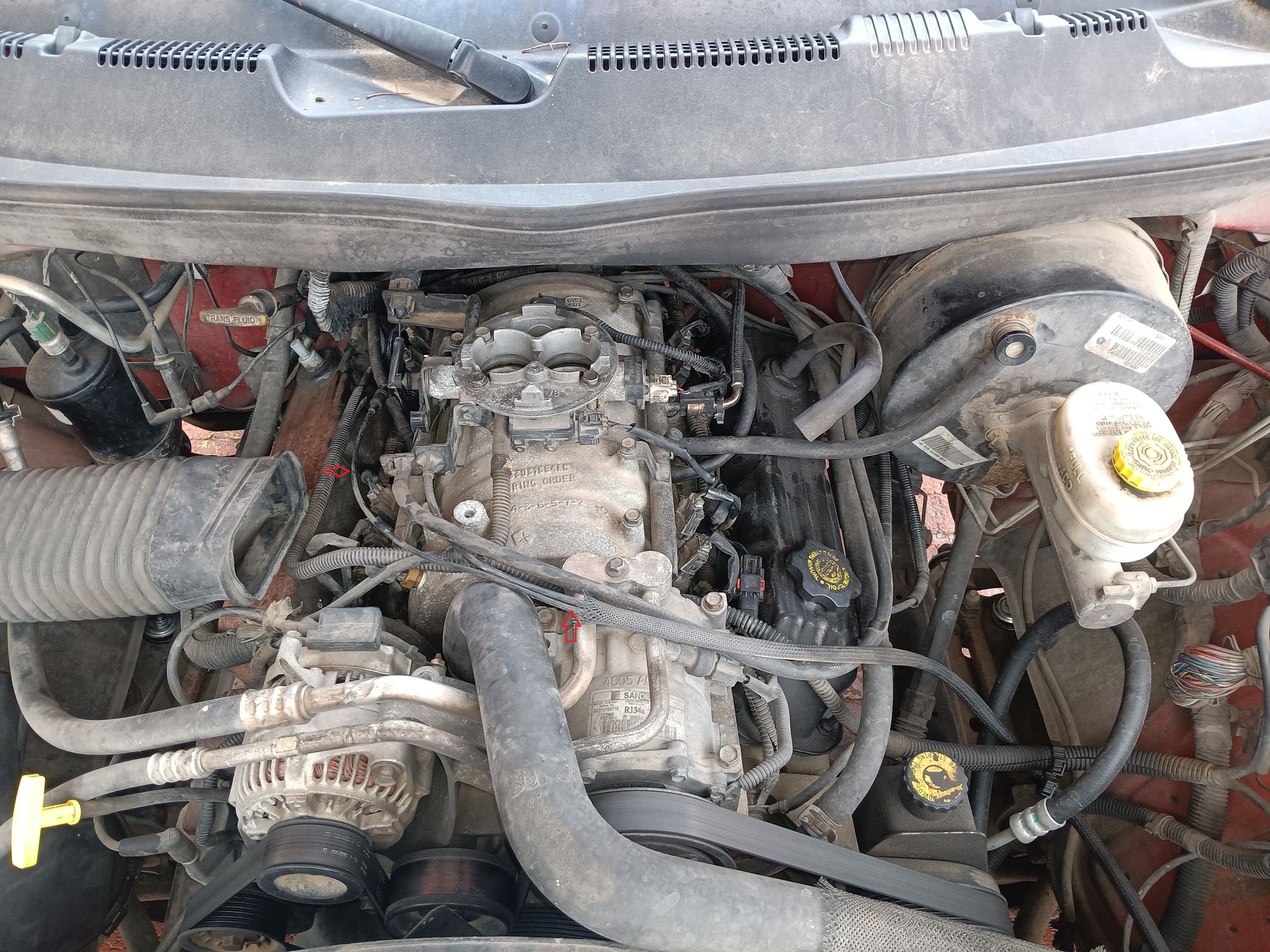 This vacuum line connects to something round under the battery box