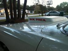 This bird is an original 383 4brl 4 speed car. The last owner removed the single 4brl and installed a six pack setup with this fiber glass hood.