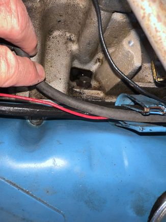 76 360 with Edelbrock manifold. I can clean this up and a few hours later it is back to some degree. I think it is coming from the bolts as I see no other place it can come from and the valve cover gaskets as they are new. 
Do these bolts have exposure to engine oil from below or are they blind holes?