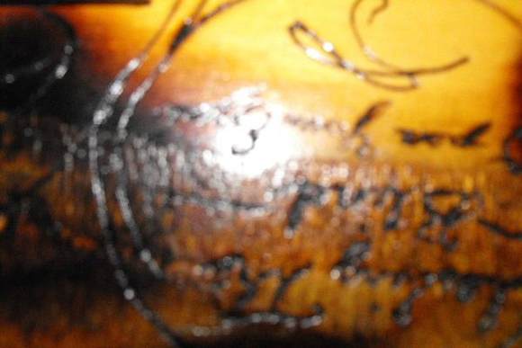 you cant really tell in the picture but it says "Leading the Blind- Open your eyes" Leading the Blind is my band name.