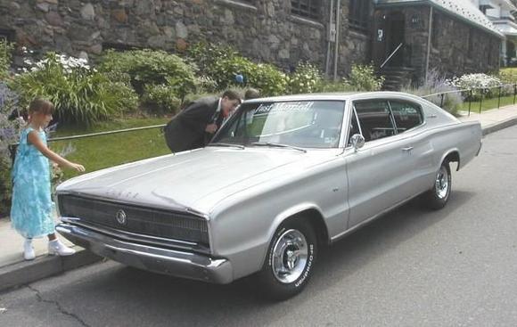 August 2, 2003: I bought the Charger from my brother on his wedding day. He owned it for 30 years. The photo is titled "Tom's Last Day"