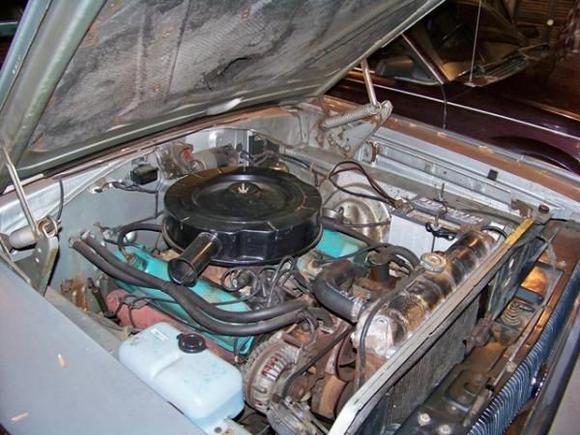 The chrome air cleaner is gone, the engine bay is now pure stock and unrestored. November 2008