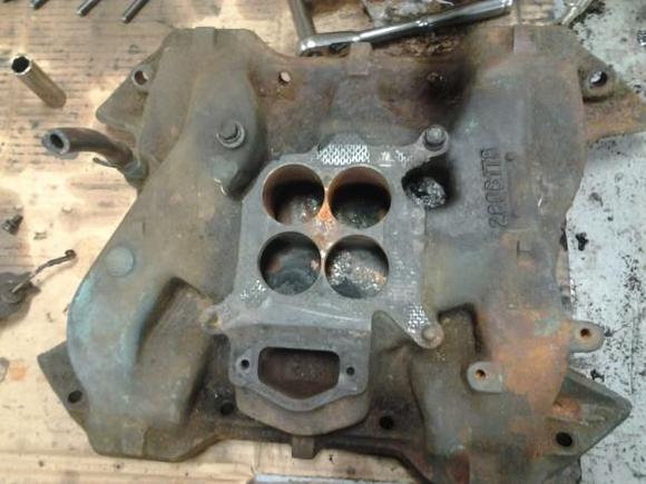Original intake manifold before cleaning.