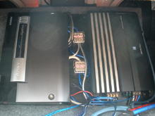 Sony xPlod 1200 watts (subs) on the left, hooked to distribution blocks, fed into my 4-channel Alpine F550 (speakers)