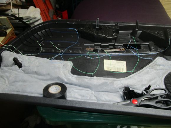 Wires tied on back side of door panel
