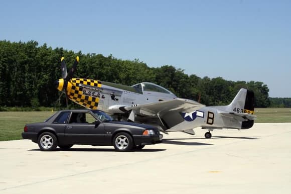 This is a pic of the car in front the P-51 mustang