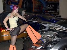 model showing off the engine