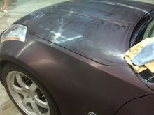 After years of hard driving the paint needed a make over.  A buddy of mine who is a high end detailer (ferrari, lambo, porsche etc) did a full job on the car.

Here the car is fully wet sanded (looks like a purple chalk board), then it was compounded, then polished then waxed.  Took him 2 days, but the results were spectacular.