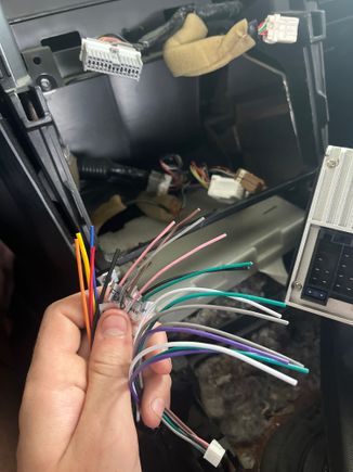 HELP!! I bought a PLZ double din radio for my 2003 350z touring. I took out the old unit to put the new one but the plugs don’t match the one in the new unit. They gave me adapters but they don’t match the colors in the car. I’m new the wiring and don’t know anything about it. What do I do??