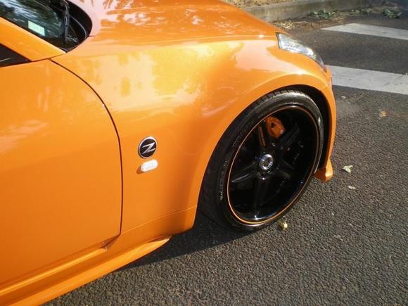 nice wheels with orange caliper