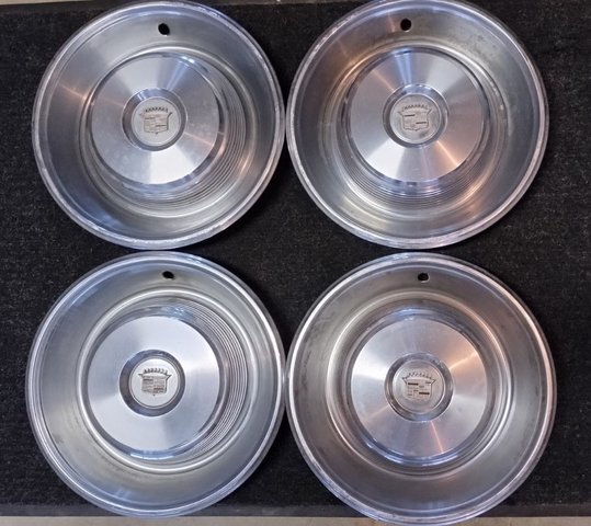 Early 70's Cadillac hubcaps set of 4 - 15"