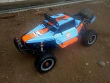 Here is the Kraken kit on the hpi Baja platform 32cc and 2wd, about 5 to 6 hp, I think.