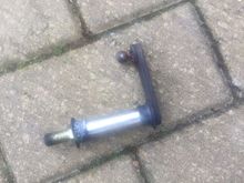 This is the centralisation/neutral shaft. These have a habit of drying out and wearing out the top hat bushes. When this happens the gear stick won't centralise when in neutral.