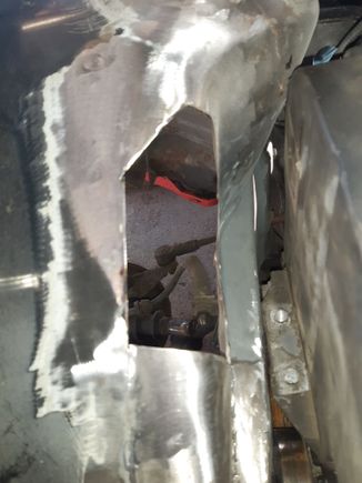 So, i got the grinder out again and chopped out the honda k20 mounts i made up last year, and put the k20 conversion on ebay. Ive decided to keep things ford and simple. Chosen engine is the "done to death blacktop zetec". With plans to turbo... rather than going down the usual way with the zetec/cvh mount i cut into the inner wing and made a mounting bracket there, before i welded anything in, i did check for clearance on full lock and the suspension in the maximum travel and clears fine.