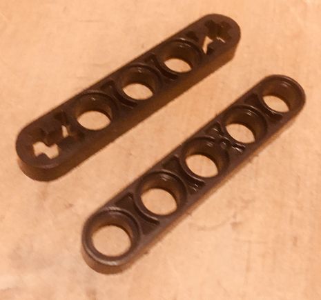 When testing the drive it was all locked, found fault in centre diff, fitted piece which stopped shafter from spinning, top wrong one bottom correct one.