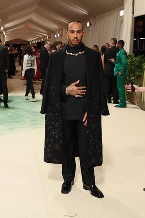 Sir Lewis Hamilton wore his old race suit to the Met Gala 2024.