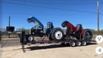 2 pulling tractors and custom trailer
