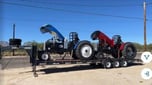 2 pulling tractors and custom trailer  for sale $40,000 