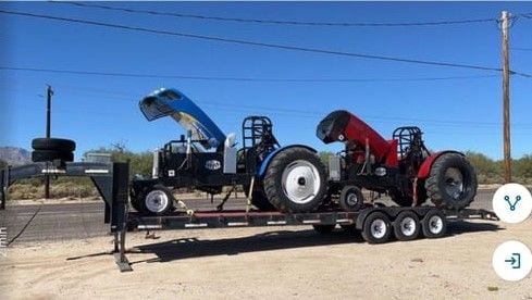 2 pulling tractors and custom trailer  for Sale $40,000 