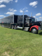 1999 KENWORTH WITH 48 FT STACKER AND PIT AWNING  for sale $215,000 