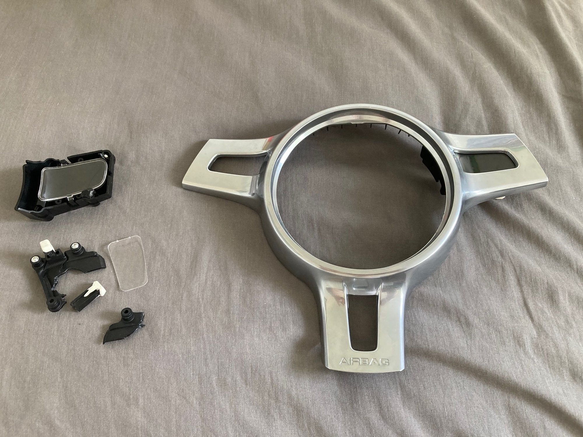 PDK Steering Wheel plastic trim broke, trying to source spares