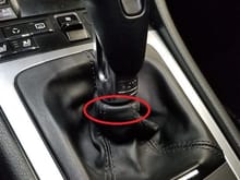 Look at the circled area.  Picture a zip tie underneath it that secures it to the PDK shaft.  The boot can still move up and down along the shaft (that's what she said), but the zip tie gives the boot a "rolled over" finished look.  