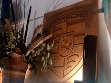 Hi team,
Looking for help/ miracle here. I have come across the pictured porsche crest in an antique store. Store owner is claiming it is a pre 88 part of a mold or part of the beginnings of a dealership sign. 
My question is by any chance can someone confirm the process or seen anything like it.  In person it does look very old. 
The material is mdf like.

Cheers in advance guys 
Jad