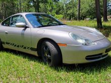 I'm told the meridian metallic is a tinted neutral with red undertones. It is kind of reddish or something at times in the sun. I might try a flat pale red color Carrera decal in place of the black at some point.