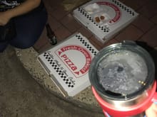 Drinking and ordering pizza in the hotel parking lot. No, we did not steal it.