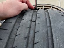 Rear tire tread close up.