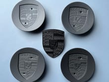 Matte black caps, black emblems