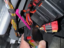 Releasing or adding terminals requires that the secondary release be removed - the secondary release is the pink lever partially removed in this photo.